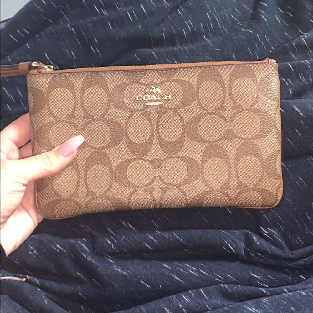 Gently used Coach Wallet, will accept offers